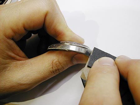 How to polish scratches out of a watch case. 